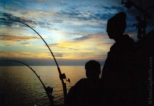 Fishing at sunset - photo